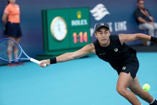 March 21, 2025, Miami Gardens, Florida, United States Of America: MIAMI GARDENS, FLORIDA - MARCH 21: Novak Djokovic of Serbia defeats Rinky Hijikata of Australia during Day 4 of the Miami Open at Hard Rock Stadium on March 21, 2025 in Miami Gardens, Florida. ...People: Rinky Hijikata Miami Gardens United States Of America - ZUMAs214 20250321_ada_s214_067 Copyright: xSMGx