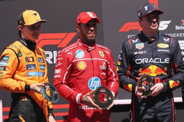 SHANGHAI, CHINA - MARCH 22: (L-R) McLaren driver Oscar Piastri of Australia, Ferrari driver Lewis Hamilton of Britain, and Red Bull driver Max Verstappen of the Netherlands celebrate on the podium after the sprint race of the Formula One Chinese Grand Prix at the Shanghai International Circuit on March 22, 2025 in Shanghai, China.  Copyright: xChinaxNewsxServicex 111556563319