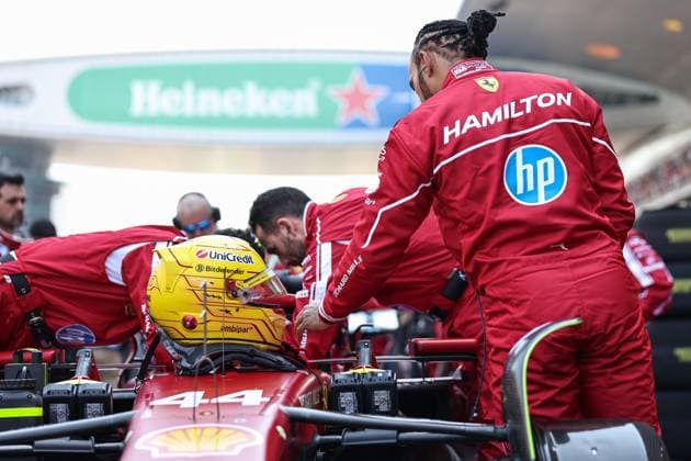 F1 Grand Prix Of China - Sprint & Qualifying Lewis Hamilton of Great Britain and Scuderia Ferrari looks on the grid during the Sprint ahead of the F1 Grand Prix of China at Shanghai International Circuit in Shanghai, China, on March 22, 2025. Shanghai Shanghai China  Copyright: xPaddockerx originalFilename:paddocker-f1grandp250322_npWBH.jpg