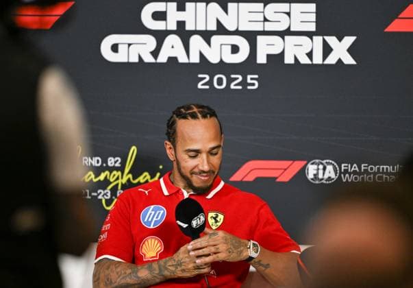 (250322) -- SHANGHAI, March 22, 2025 -- Ferrari s driver Lewis Hamilton of Britain reacts during the press conference, PK, Pressekonferenz after the sprint race of the Formula 1 Chinese Grand Prix at the Shanghai International Circuit in east China s Shanghai, March 22, 2025. ) (SP)CHINA-SHANGHAI-FORMULA 1-SPRINT(CN) XiaxYifang 