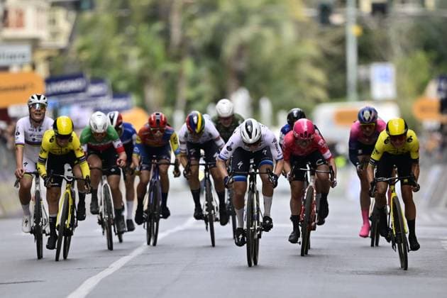 Belgian Lotte Kopecky of SD Worx-Protime (L), Dutch Lorena Wiebes of SD Worx-Protime (C) and Dutch Marianne Vos of Team Visma-Lease a Bike (R) sprint to the finish of the Milano-Sanremo Donne one day cycling race for women, 156km from Milan to Sanremo, Italy, Saturday 22 March 2025. DIRKxWAEM  x115407152x