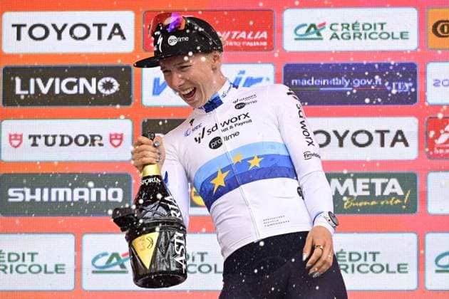 Dutch Lorena Wiebes of SD Worx-Protime celebrates on the podium with champagne after winning the Milano-Sanremo Donne one day cycling race for women, 156km from Milan to Sanremo, Italy, Saturday 22 March 2025. DIRKxWAEM  x115407255x