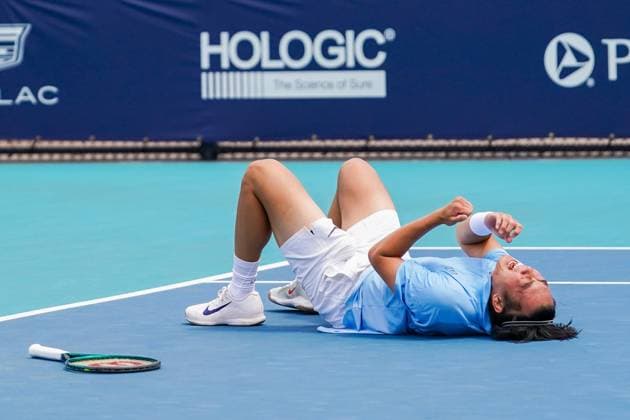 March 22, 2025, Miami, Florida, USA: Coleman Wong (HKG) reacts after defeating Ben Shelton (not pictured) during his mens singles second round match at the 2025 Miami Open presented by Itau at Hard Rock Stadium. Miami USA - ZUMAw109 20250322_fap_w109_008 Copyright: xDebbyxWongx