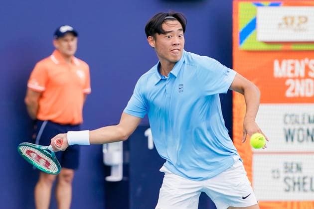 March 22, 2025, Miami, Florida, USA: Coleman Wong (HKG) returns a shot to Ben Shelton (not pictured) during his mens singles second round match at the 2025 Miami Open presented by Itau at Hard Rock Stadium. Miami USA - ZUMAw109 20250322_fap_w109_020 Copyright: xDebbyxWongx