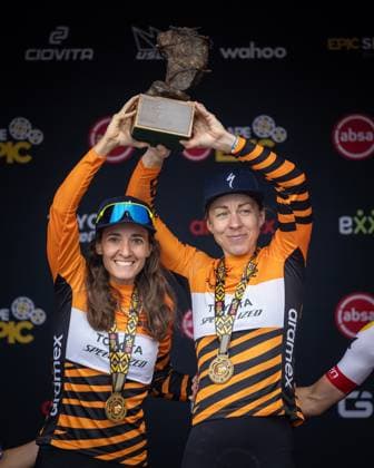 Danish-Argentine duo Annika Langvad, right, and Sofia Gomes Villafane celebrate after winning the eight-day Cape Epic mountain bike pairs stage race in South Africa, Lourensford, March 23, 2025. (CTKxPhoto MichalxCerveny) CTKPhotoF202503230004501  CTKPhotoF202503230004501