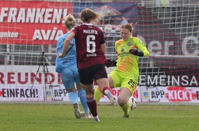23.03.2025 - Fussball - Saison 2024 2025 - 2. Frauen - Fussball - Bundesliga - 19. Spieltag: 1. FC Nürnberg FCN ( Club Clubfrauen ) - VfL Bochum - Sportfoto Zink DaMa - xdaxmax - Tor Treffer Torschuß zum 0:1 - Torschütze Mara Wilhelm (7, VfL Bochum ) gegen Kristin Krammer (25, 1. FC Nürnberg FCN )