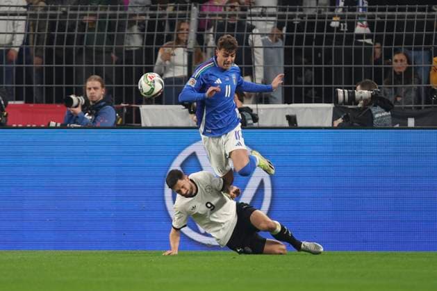 Tim Kleindienst (Deutschland) und Daniel Maldini (Italien) battle for the ball during the UEFA Nations League Quarterfinal Leg Two match between Germany and Italy at Football Stadium Dortmund on March 23, 2025 in Dortmund, Germany. (Photo by Oliver Kaelke DeFodi Images)
