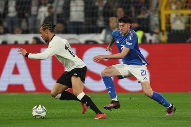 Leroy SanÃ (Deutschland) und Alessandro Bastoni (Italien) battle for the ball during the UEFA Nations League Quarterfinal Leg Two match between Germany and Italy at Football Stadium Dortmund on March 23, 2025 in Dortmund, Germany. (Photo by Oliver Kaelke DeFodi Images)