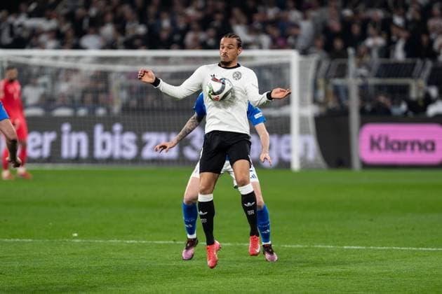 GER, Nations League, Deutschland vs Italien 23.03.2025, Signal Iduna Park, Dortmund, GER, Nations League, Deutschland vs Italien im Bild: Zweikampf zwischen Leroy SanÃ Sane (Deutschland, 19) und Alessandro Bastoni (Italien ITA, 21) nimmt den mit der Brust an