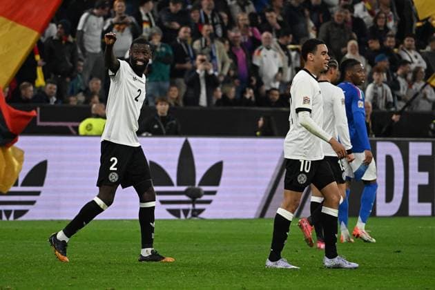 23.03.2025, xsltx, Fussball UEFA Nations League, Deutschland - Italien v.l. Torjubel nach dem Tor zum celebrating the goal celebrate 2:0 durch Jamal Musiala (Deutsche Fussball Nationalmannschaft DFB) mit Antonio Rüdiger (Deutsche Fussball Nationalmannschaft DFB) (DFL DFB REGULATIONS PROHIBIT ANY USE OF PHOTOGRAPHS as IMAGE SEQUENCES and or QUASI-VIDEO) Dortmund