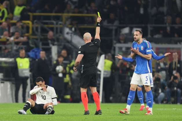 Riccardo Calafiori (Italien) gets the yellow card during the UEFA Nations League Quarterfinal Leg Two match between Germany and Italy at Football Stadium Dortmund on March 23, 2025 in Dortmund, Germany. (Photo by Oliver Kaelke DeFodi Images)