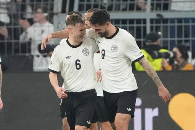 celebrate the goal, Torjubel zum 3:0 Tim Kleindienst (Deutschland Germany, 9) mit Joshua Kimmich (Deutschland Germany, 6) - Dortmund 23.03.2025: Deutschland vs. Italien, UEFA Nations League Viertelfinale Rückspiel, Signal Iduna Park