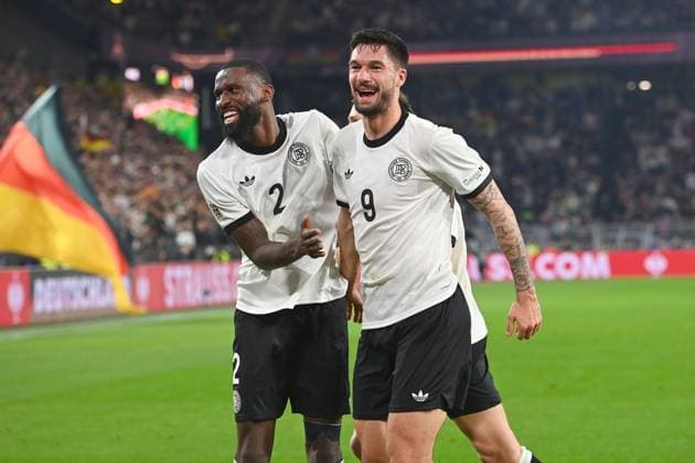 Torjubel Tim KLEINDIENST (GER) mit Antonio Ruediger (GER,li) nach Tor zum 3-0, Jubel,Freude,Begeisterung,Aktion. Fussball Nations League Viertelfinale Deutschland (GER) - Italien (ITA) am 23.03.2025, Signal Iduna Park