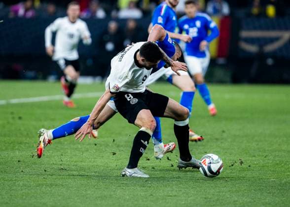 Signal-Iduna-Park, Dortmund, 23.03.2025: Tim Kleindienst of Germany gets penalty after foul from Alessandro Buongiorno of Italia during the UEFA Nations League Quarterfinal Match Germany v Italia.