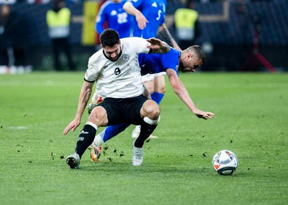 Signal-Iduna-Park, Dortmund, 23.03.2025: Tim Kleindienst of Germany gets penalty after foul from Alessandro Buongiorno of Italia during the UEFA Nations League Quarterfinal Match Germany v Italia.