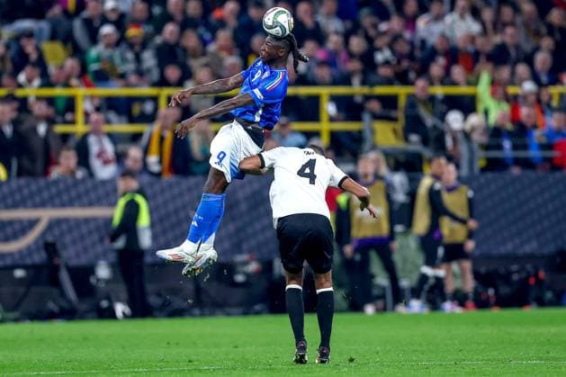 23.03.2025, Fußball, Viertelfinale UEFA Nations League, Deutschland - Italien, Signal Iduna Park, Saison 2024 2025: Moise Kean (ITA 09) im Zweikampf gegen Jonathan Tah (GER 04) Kopfball Kopfballduell DFB regulations prohibit any use of photographs as image sequences and or quasi-video. Nordrhein-Westfalen Deutschland