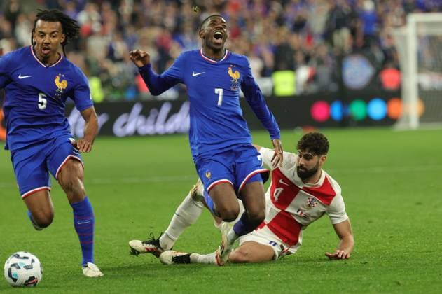 Foot Ligue des nations France - Croatie PHOTOPQR LE PARISIEN Olivier Arandel ; Saint-Denis ; 23 03 2025 ; Saint-Denis, France Stade de France Dimanche 23 mars 2025 Football Équipe de France UEFA Ligue des nations A, (Retour) France-Croatie Jules Koundé, Ousmane Dembélé et Josko Gvardiol LP Olivier Arandel