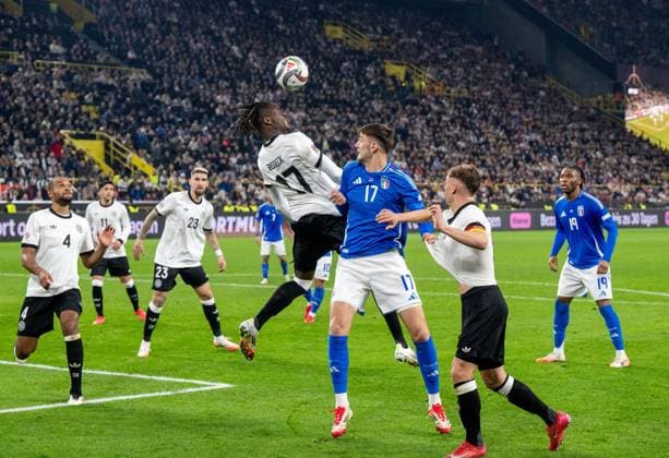 Fußball, Herren, Saison 2024 25, UEFA Nations League (Viertelfinale Rückspiel) in Dortmund, Deutschland - Italien, v. l. Jonathan Tah (Deutschland), Nadiem Amiri (Deutschland), Robert Andrich (Deutschland), Yann-Aurel Bisseck (Deutschland), Matteo Ruggeri (Italien), Joshua Kimmich (Deutschland), Destiny Udogie (Italien), 23.03. 2025, Copyright: xMatthiasxKochx