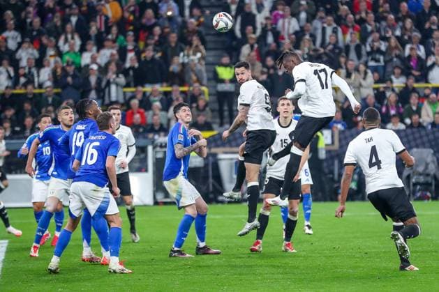 23.03.2025, Fußball, Viertelfinale UEFA Nations League, Deutschland - Italien, Signal Iduna Park, Saison 2024 2025: Strafraumaktion Kopfball Tim Kleindienst (GER 09) Yann Aurel Bisseck (GER 17) DFB regulations prohibit any use of photographs as image sequences and or quasi-video. Nordrhein-Westfalen Deutschland
