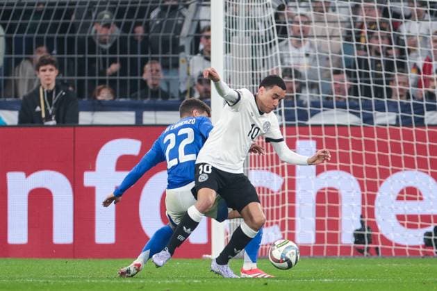 22.03.2025, UEFA Nations League, Viertelfinale, Rueckspiel, Deutschland - Italien, v. l. Giovanni Di Lorenzo (Italien), Jamal Musiala (Deutschland), Dortmund Signal Iduna Park NRW Deutschland xRHR-FOTO DEx Copyright: DennisxEwert RHR-FOTOx RHR-FOTO DE