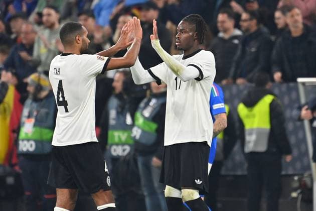 Schlussjubel v.re:Yann BISSECK (GER), Jonathan Tah (GER).Aktion, Fussball Nations League Viertelfinale Deutschland (GER) - Italien (ITA) 3-3 am 23.03.2025, Signal Iduna Park