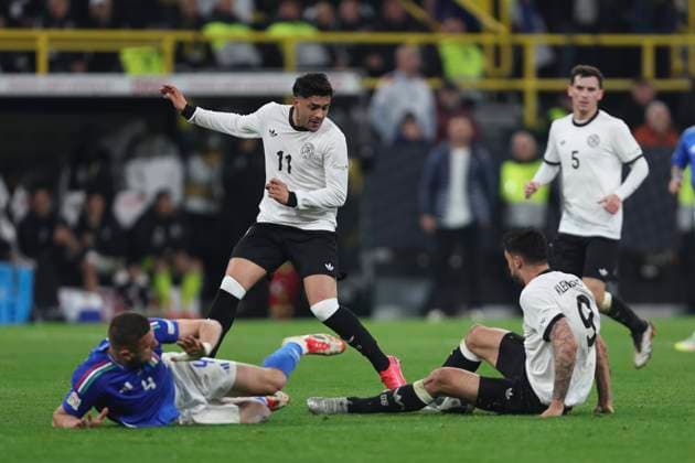 Alessandro Buongiorno (Italien), Nadiem Amiri (Deutschland) und Tim Kleindienst (Deutschland) battle for the ball during the UEFA Nations League Quarterfinal Leg Two match between Germany and Italy at Football Stadium Dortmund on March 23, 2025 in Dortmund, Germany. (Photo by Oliver Kaelke DeFodi Images)