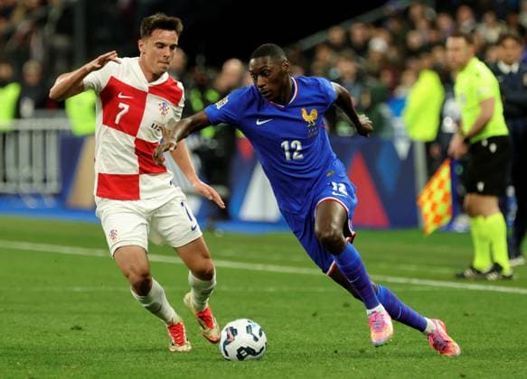 Foot Ligue des nations France - Croatie PHOTOPQR LE PARISIEN Olivier Arandel ; Saint-Denis ; 23 03 2025 ; Saint-Denis, France Stade de France Dimanche 23 mars 2025 Football Équipe de France UEFA Ligue des nations A, (Retour) France-Croatie Nikola Moro et Randal Kolo Muani LP Olivier Arandel