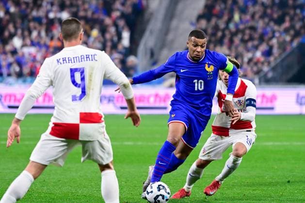 FOOTBALL : France vs Croatie - Ligue des Nations - 23 03 2025 Andrej Kramaric ( 9 - Croatia ) , Kylian Mbappe ( 10 - France ) and Luka Modric ( 10 - Croatia ) during the UEFA Nations League match between France and Croatia at Stade de France on March 23, 2025 in Paris, France. ( Photo by Dante Badano PsnewZ ) - ParisFrance  Copyright: xDantexBadanox