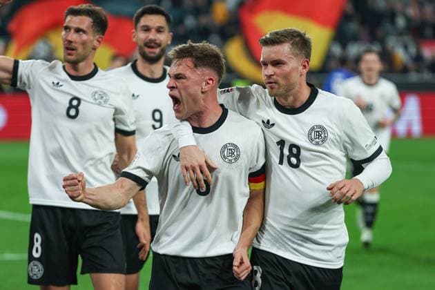 UEFA Nations League - 24 25 - Deutschland - Italien am 23.03.2025 im Signal Iduna Park in Dortmund Jubel, Torjubel, Torschuetze, Torschütze Joshua Kimmich (Deutschland 6) jubelt nach seinem Tor zum 1 zu 0 mit Maximilian Mittelstädt Mittelstaedt (Deutschland 18)
