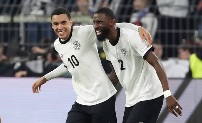 Jamal Musiala jubelt nach 2:0 mit Antonio Rüdiger Freude Emotion Jubel Fußball Fussball Nations League Länderspiel Nationalmannschaft DFB Herren Saison 2024 2025 23.03.2025 Deutschland GER vs. Italien ITA DFL regulations prohibit any use of photographs as image sequences and or quasi-video.