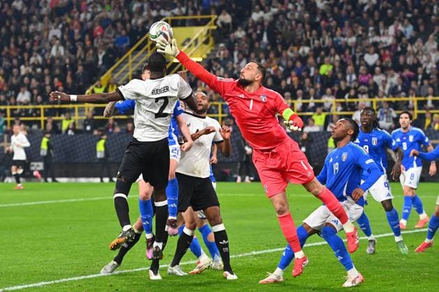 Strafraumszene.v.li:Antonio Ruediger (GER),Torwart Gianluigi DONNARUMMA (ITA),Destiny UDOGIE( ITA), Aktion. Fussball Nations League Viertelfinale Deutschland (GER) - Italien (ITA) 3-3 am 23.03.2025, Signal Iduna Park