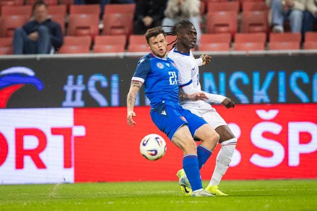 SLOVAKIA U21, U 21 - FRANCE U21 Samuel Kopasek of Slovakia and Loum Tchaouna of France during the friendly international football match ahead of 2025 UEFA European Under-21 Championship between Slovakia U21 and France U21. Trnava, Slovakia, March 24, 2025. Photo by Branislav Racko Copyright: xx 080A8400