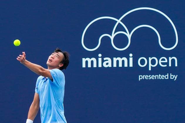 March 24, 2025, Miami, Florida, USA: Coleman Wong (HKG) serves to Adam Walton (not pictured) during the men s singles third round match at the 2025 Miami Open presented by Itau at Hard Rock Stadium. Miami USA - ZUMAw109 20250324_fap_w109_004 Copyright: xDebbyxWongx