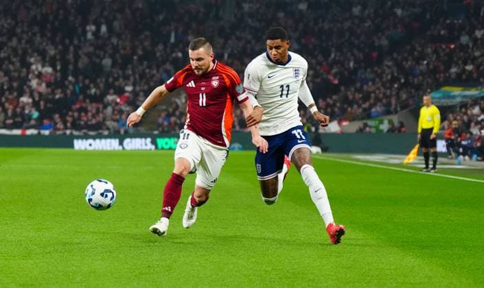 Roberts Savalnieks of Latvia battles with Marcus Rashford of England England v Latvia, FIFA 2026 World Cup Qualifying, Group K, Football, Wembley Stadium, London, UK - 24 Mar 2025 EDITORIAL USE ONLY No use with unauthorised audio, video, data, fixture lists, club league logos or live services. Online in-match use limited to 120 images, no video emulation. No use in betting, games or single club league player publications. Copyright: xJavierxGarcia Shutterstockx 15219744m