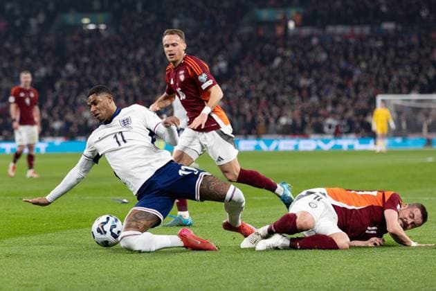 Football; 2026 FIFA World Cup, WM, Weltmeisterschaft, Fussball European Qualifiers; England vs Latvia; Wembley Stadium, Monday 24th March 2025; Roberts Savalnieks of Latvia tackles Marcus Rashford of England, penalty check 24 Mar 2025 UEFA Qualification, 1st Round: Group K, England versus Latvia Editorial use only  Copyright: xIanxStephen Shutterstockx 15220701h