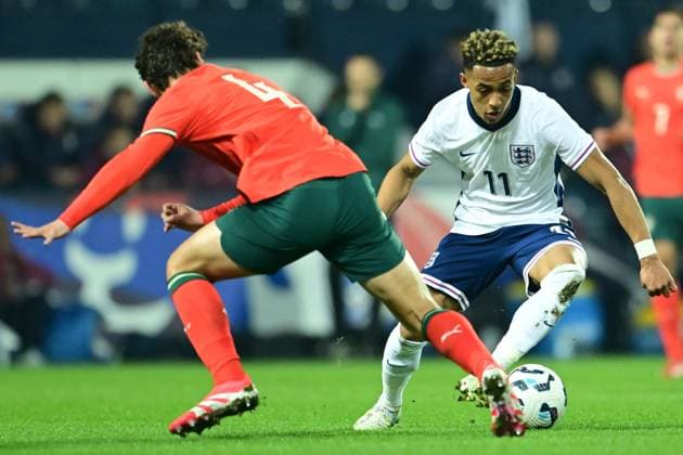 U21, U 21 England v U21 Portugal U21 International 24 03 2025. England U-21 forward Omari Hutchinson (11) under pressure from Portugal U-21 defender Eduardo Quaresma (4) during the U21 international match, Länderspiel, Nationalmannschaft between U21 England and U21 Portugal at the Hawthorns, West Bromwich, United Kingdom on 24 March 2025. West Bromwich Hawthorns United Kingdom Editorial use only , Copyright: xDennisxGoodwinx PSI-21667-0017