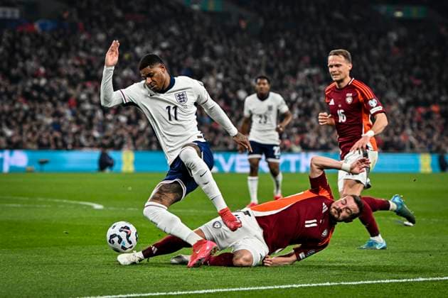 24th March 2025; Wembley Stadium, London, England; FIFA World Cup, WM, Weltmeisterschaft, Fussball Qualifying Group K International Football, England versus Latvia; Emils Birka of Latvia makes a key defensive tackle on Marcus Rashford of England  ActionPlus12766392 GodfreyxPitt