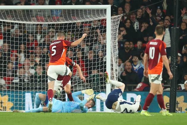 England v Latvia Goalkeeper Krisjanis Zviedris of Latvia tangles with Jarrod Bowen of England after dropping the ball during the England v Latvia UEFA World Cup Qualifier Group K match at Wembley Stadium, London, England, United Kingdom on 24 March 2025 Credit: Katie Chan Every Second Media Editorial use only. All images are copyright Every Second Media Limited. No images may be reproduced without prior permission. Copyright: xIMAGO EveryxSecondxMediax ESM-1391-0026 KatiexChanx xEveryxSecondxMediax
