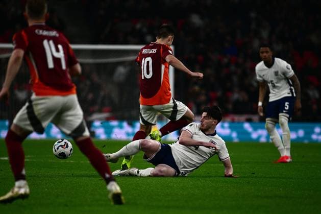 England v Latvia , London, UK - 24 Mar 2025 Declan Rice of England challenges for the ball with Janis Ikaunieks of Latvia during the FIFA World Cup, WM, Weltmeisterschaft, Fussball Qualifier match between England and Latvia on the 24th March 2025 at Wembley Stadium,, London on 24 Mar 2025 London Wembley Stadium London GBR Copyright: xGeorgexWass PPAUKx PPA-175950