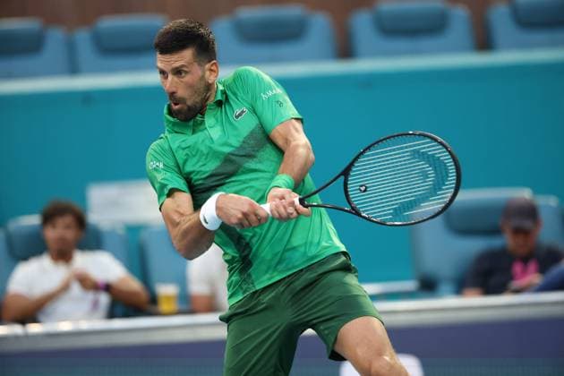 March 25, 2025, Miami Gardens, Florida, United States Of America: MIAMI GARDENS, FLORIDA - MARCH 25: Novak Djokovic of Serbia defeats Lorenzo Musetti of Italy in the fourth round of the men s singles during Day 8 of the Miami Open at Hard Rock Stadium on March 25, 2025 in Miami Gardens, Florida....People: Novak Djokovic Miami Gardens United States Of America - ZUMAs214 20250325_ada_s214_007 Copyright: xSMGx