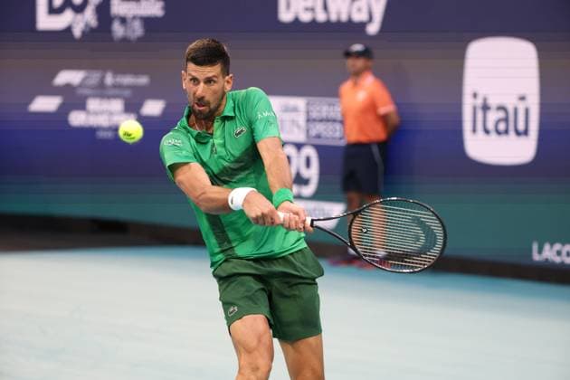 March 25, 2025, Miami Gardens, Florida, United States Of America: MIAMI GARDENS, FLORIDA - MARCH 25: Novak Djokovic of Serbia defeats Lorenzo Musetti of Italy in the fourth round of the men s singles during Day 8 of the Miami Open at Hard Rock Stadium on March 25, 2025 in Miami Gardens, Florida....People: Novak Djokovic Miami Open 2025 - Day 8  - ZUMAs214 20250325_ada_s214_074 Copyright: xSMGx