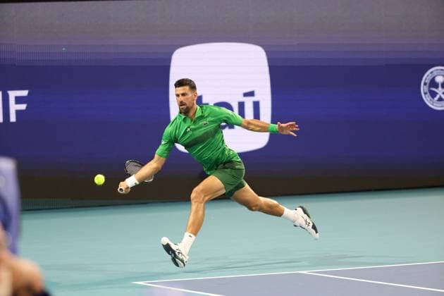March 25, 2025, Miami Gardens, Florida, United States Of America: MIAMI GARDENS, FLORIDA - MARCH 25: Novak Djokovic of Serbia defeats Lorenzo Musetti of Italy in the fourth round of the men s singles during Day 8 of the Miami Open at Hard Rock Stadium on March 25, 2025 in Miami Gardens, Florida....People: Novak Djokovic Miami Gardens United States Of America - ZUMAs214 20250325_ada_s214_091 Copyright: xSMGx