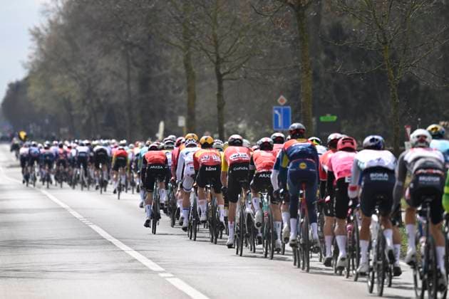 Classic Brugge De Panne 2025 cycling race DE PANNE, BELGIUM - MARCH 26 : illustration picture peloton during the Men Elite UCI World Tour 49th Classic Brugge De Panne cycling race with start in Brugge and finish in De Panne (195,6 km) on March 26, 2025 in De Panne, Belgium, 26 03 2025 ( Motordriver Kenny Verfaillie & De Panne Belgium  Copyright: xNicoxVereeckenx