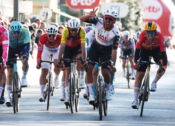 Colombian Sebastian Molano of UAE Team Emirates celebrates after winning the Classic Brugge-De Panne men s elite one-day cycling race, 195,6 km from Brugge to De Panne, Wednesday 26 March 2025. KURTxDESPLENTER  x115908499x