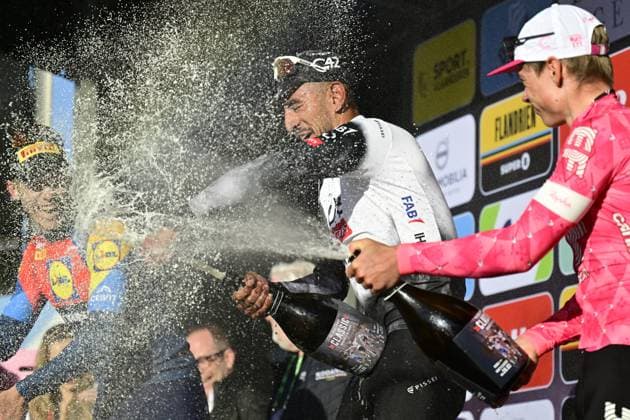 Italian Jonathan Milan of Lidl-Trek, Colombian Juan Sebastian Molano of UAE Team Emirates and Estonian Madis Mihkels of EF Education-EasyPost celebrate on the podium of the Classic Brugge-De Panne men s elite one-day cycling race, 195,6 km from Brugge to De Panne, Wednesday 26 March 2025. DIRKxWAEM  x115915721x