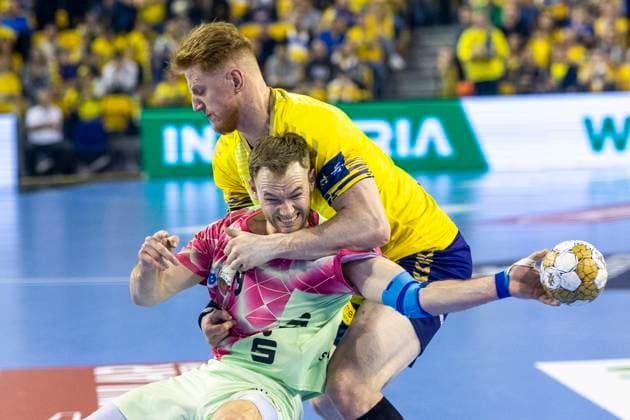 Sport Bilder des Tages EHF Champions League - Industria Kielce v Fuchse Berlin Mathias Gidsel, Tomasz Gebala during the match EHF Champions League Men match between Industria Kielce and Fuchse Berlin in Kielce, Poland on March 26, 2025. Kielce Poland  Copyright: xAndrzejxIwanczukx originalFilename:iwanczuk-ehfchamp250326_np9uI.jpg