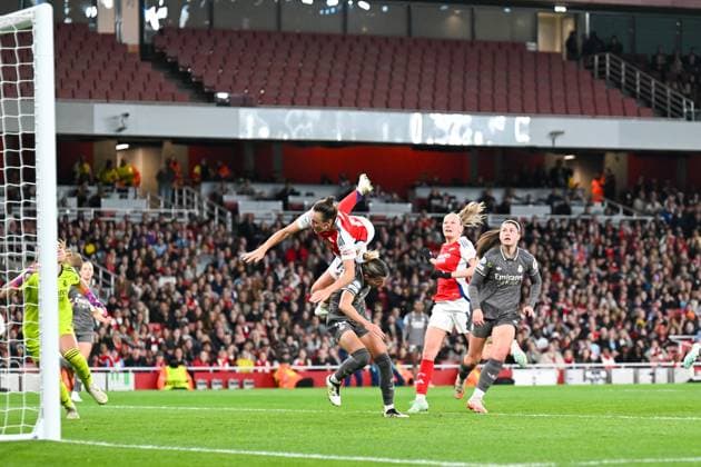 Kim Little of Arsenal Women challenges for the crossed ball and somersaults over Shelia Garcia of Real Madrid Women during the Womens Champions League match between Arsenal Women and Real Madrid Women at the Emirates Stadium, London, England on 26 March 2025. Copyright: xPhilxHutchinsonx 42890008