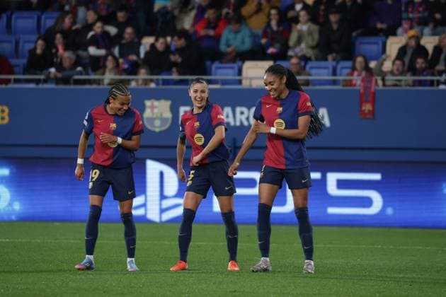 Spain - UEFA Women s Champions League - FC Barcelona, Barca vs VfL Wolfsburg - 27 03 2025 SPAIN, BARCELONA, MARCH 27. Salma Paralluelo (R) of FC Barcelona celebrates with Jana Fernandez (C) of FC Barcelona and Vicky Lopez (L) of FC Barcelona after scoring his side™s second goal while Anneke Borbe of Wolfsburg looks dejected during the UEFA Women s Champions League quarterfinals second leg match between FC Barcelona and VfL Wolfsburg on March 27, 2024 at Estadi Johan Cruyff in Barcelona, Spain. Photo by Manuel Blondeau AOP.Press Barcelona Estadi Johan Cruyff Catalunya Spain Copyright: x ManuelxBlondeau AOP.Pressx AOP20250327 0007