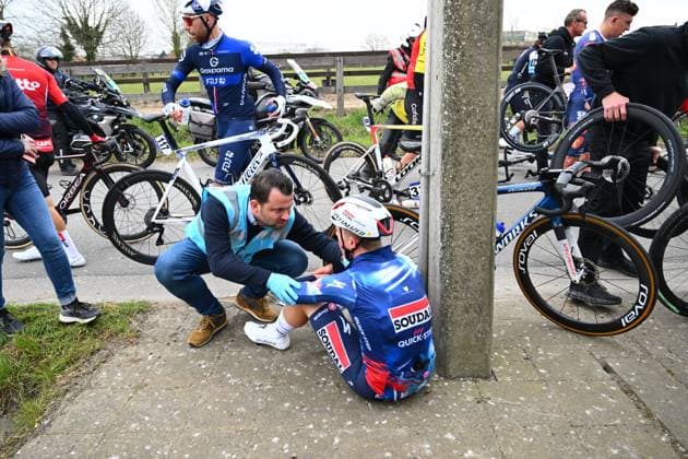 E3 Saxo Classic 2025 Cycling Race Harelbeke, Belgium - March 28 : Crash of Van Gestel Dries (BEL) of Soudal Quick-Step during the Men Elite UCI World Tour 68th E3 Saxo Classic cycling race of 208 kms with start in Harelbeke and finish in Harelbeke on March 28, 2025 in Harelbeke, Belgium, 28 03 2025 ( Motordriver Kenny Verfaillie - Harelbeke Belgium  Copyright: xVincentxKalutx