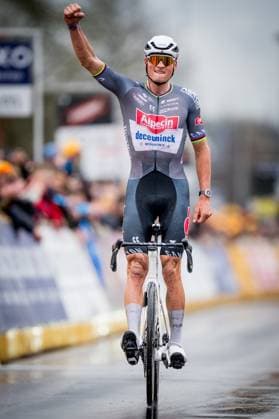 Dutch Mathieu van der Poel of Alpecin-Deceuninck celebrates as he crosses the finish line to win the E3 Saxo Bank Classic one day cycling race, 208,8 km from and to Harelbeke, on Friday 28 March 2025. JASPERxJACOBS  x116570021x